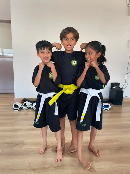 Sport doesn’t just build physical fitness, it nurtures lifelong friendships. These three Kikkers are all smiles after class.