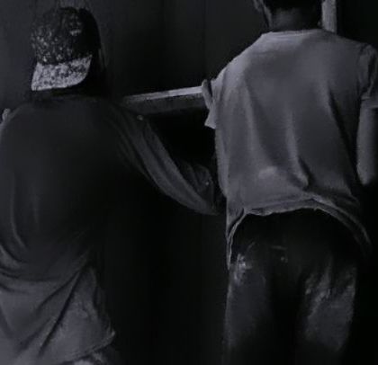 The process of applying textured lime plaster to a wall, a craft that we explore to create unique, tactile surfaces that interact with light.