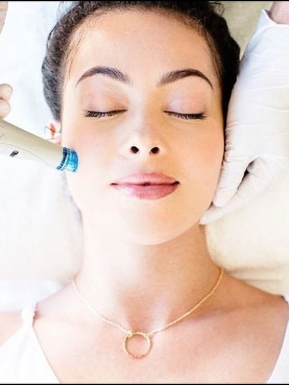 A serene shot of a patient receiving a HydraFacial. This treatment is a relaxing and highly effective way to maintain skin health, providing deep cleansing and hydration in one session.