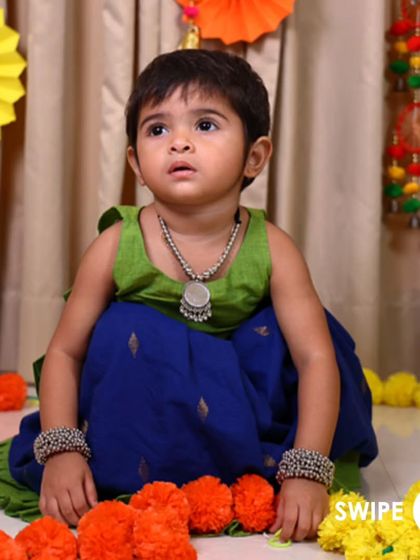 The Nila Ghagra Choli in green and blue is perfect for little ones who love to play. The cotton fabric is breathable and soft, ensuring they can move freely while looking adorable.