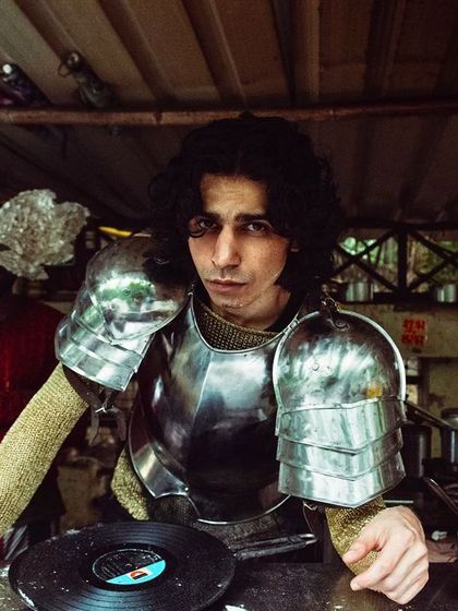 A quirky and amusing shot from my impromptu armor shoot. A knight at a chai stand, complete with a vinyl record. It’s all about finding magic in the everyday.