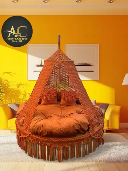 An earthy orange bed swing that brings warmth to any room. It's large enough to share with friends on a cold evening, making your conversations even cozier.