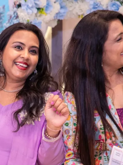 A candid moment of laughter with a guest. My job is to be a friend and host, making sure everyone feels comfortable and happy throughout the celebration.