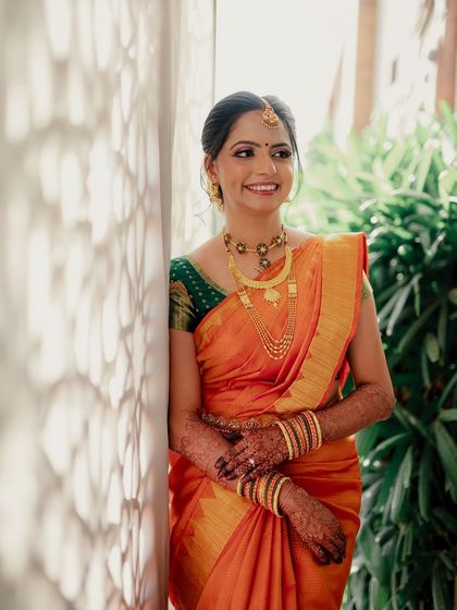 A beautiful, light-filled portrait, her smile and glowing skin taking center stage.