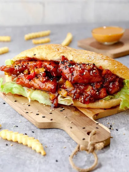 Another angle of the delicious Korean sandwich, showing the saucy filling.
