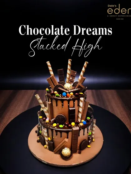 Chocolate dreams stacked high. This two-tier chocolate overload cake is dripping with ganache and loaded with wafers, chocolate bars, and candies for a truly showstopping celebration.