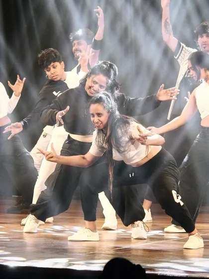 The pure joy and power of performance. A shot from Prayaan 2023 where our dancers command the stage with a dynamic hip hop routine, complete with professional lighting and effects.