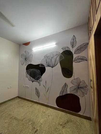 A different view of the boho mural, highlighting the interplay between the delicate line art and the solid color blocks.