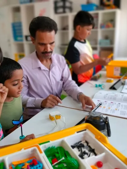 We provide a supportive environment where every question is encouraged. An instructor works with a small group of young learners, ensuring they grasp the fundamentals of building with LEGOs.