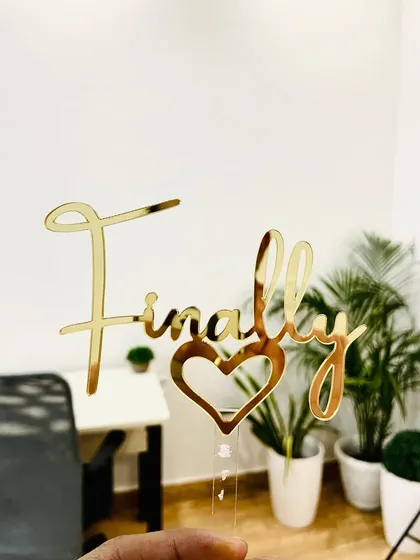 After all the waiting, it's time to celebrate! The "Finally" topper with a heart is perfect for long-awaited weddings, engagements, or any milestone you've been looking forward to.