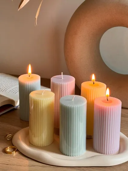 The soft glow of our pastel pillar candles creates an atmosphere of pure tranquility. Made with our signature dripless technology, you can enjoy their beauty on any surface without worry, making them a perfect centerpiece for your tables and shelves.