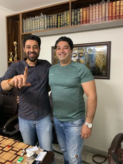 A candid moment in my office with a friend and colleague. Building strong professional relationships is a key part of my practice and helps create a supportive network for everyone.