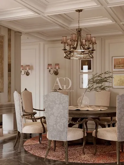 I designed this dining nook for more intimate gatherings. The round table encourages conversation, while the damask-upholstered chairs and coffered ceiling maintain the home's overall feeling of timeless, classical elegance.