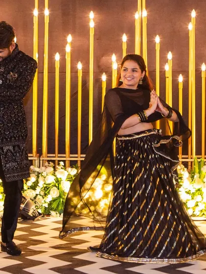 Capturing the perfect moment during a couple's sangeet dance. We focus on choreography that feels natural and fun, allowing you to connect and enjoy your performance together against a beautiful backdrop.