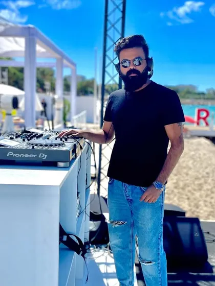 A sundowner set in Cannes, France. My work takes me global, and I'm an expert at crafting the perfect daytime beach party vibe, blending international hits with a relaxed, sophisticated feel for your corporate retreat or destination event.