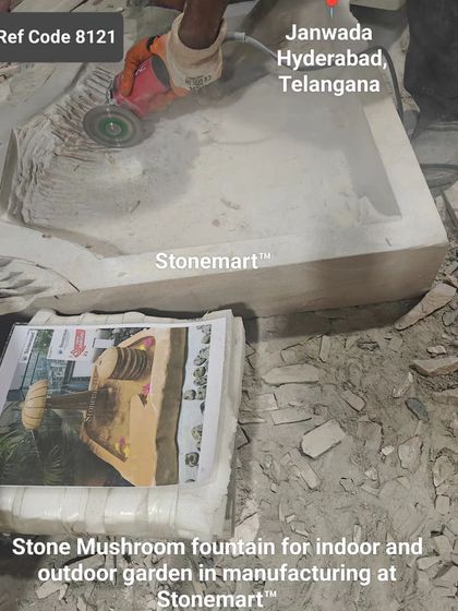 A stone mushroom fountain is being manufactured for a client in Hyderabad. The process starts with a large block of stone.