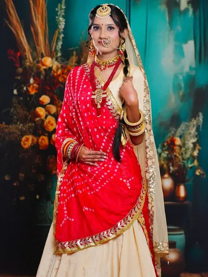Another angle of the student's Rajasthani bridal creation, highlighting the intricate jewelry and the balance between the colorful attire and the makeup.