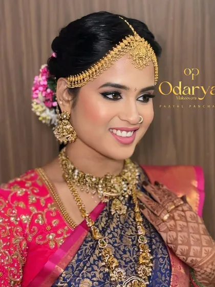 The complete look, showcasing the stunning temple jewellery and the rich silk saree. My makeup is designed to complement the entire bridal attire, creating a cohesive and breathtaking appearance.