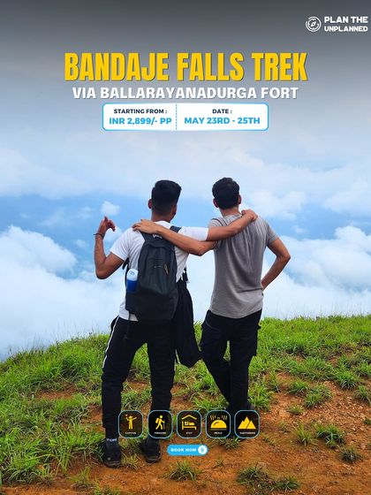 Two friends on the Bandaje Falls trek, enjoying the view together.