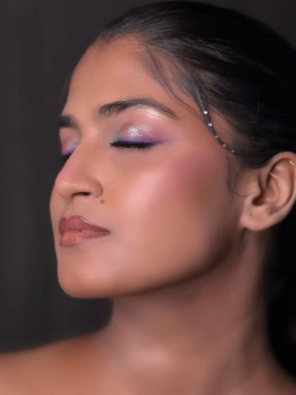 A stunning color pop moment on our beautiful dusky muse. This look, created by a student, is an example of the fearless expression we encourage at the academy.