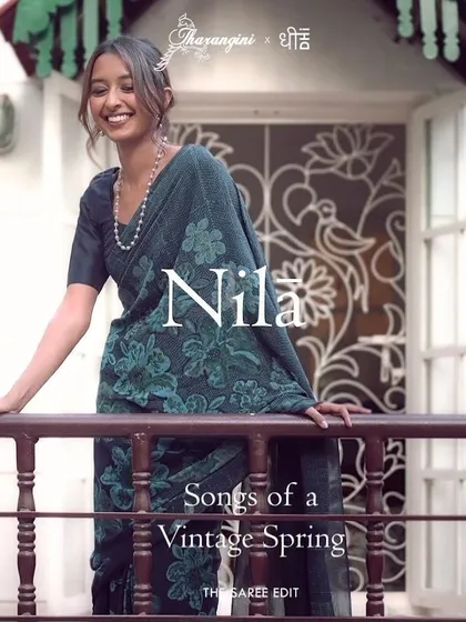This is our hero item. The Nilā saree embodies our craft. It is a deep indigo silk georgette piece that took over 60 hours to create, combining intricate textures and custom-carved floral motifs using a specialized discharge printing technique.