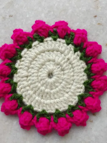 The finished rosebud coaster. I am excited to add this new floral design to my collection.