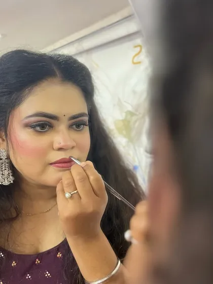 This over-the-shoulder view shows the process of defining the lips. In my classes, students get to practice these techniques on models to build their practical skills and confidence.