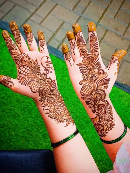 A close-up of the same design, showing the name "Puja" subtly included in the pattern.