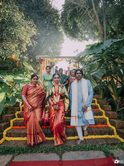 A duplicate of the bride's grand entrance with her parents.