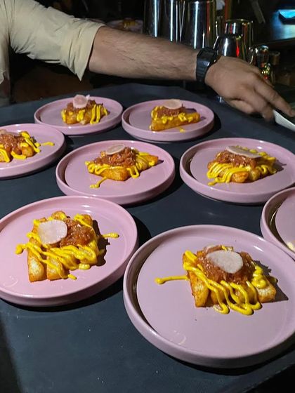 Patatas Bravas being prepared for our ZNMD screening. This classic Spanish tapa, with its bold flavors, is the perfect dish to kick off our culinary journey as the film's story begins in Barcelona.