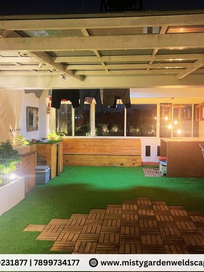 This image shows the practical side of our terrace designs, with a seating area and a space for drying clothes, all neatly integrated under a single pergola structure.