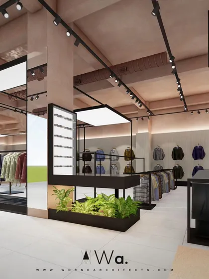 We used integrated planters as natural space dividers in this retail project. The greenery adds a fresh, organic element that contrasts with the clean lines of the display units and the polished floor.