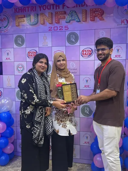 A proud moment being felicitated on stage at the Khatri Youth Foundation event. It's always a pleasure to be recognized for my work and to connect with the organizers and my community.