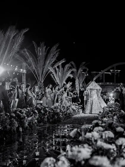 A bride's grand entrance, a moment we've perfected over 7 years. We handle everything, from vendor calls to last-minute changes, because we care about the story and the people in it.
