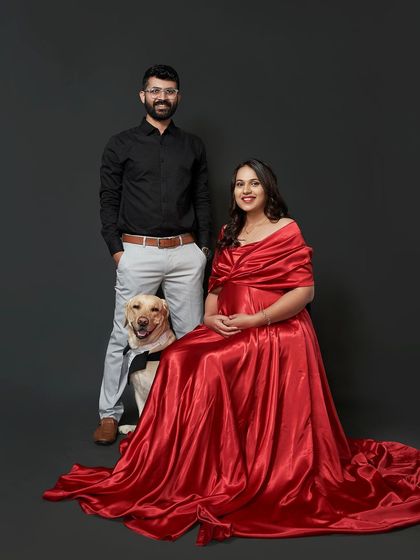 A classic family portrait with their beloved pet. Our studio is happy to welcome your furry friends to be part of your special shoot.