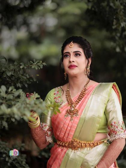 A thoughtful portrait of the bride. The makeup is soft and flattering, enhancing her features without overpowering her natural beauty for this pre-wedding event.