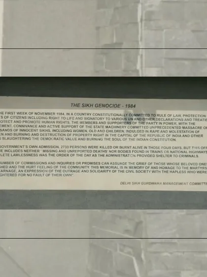 An informational plaque at the memorial detailing the events of "The Sikh Genocide - 1984." The text presents a specific, community-sanctioned narrative of the violence, which is a key point of analysis in my work on public memory.