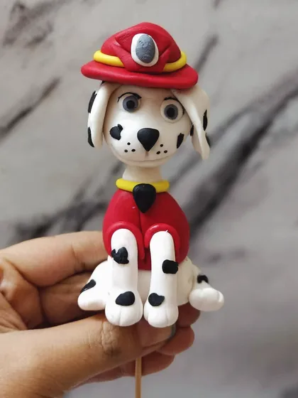 This is my cutest creation, a handmade fondant figure of Marshall from Paw Patrol. He's almost too cute to eat!