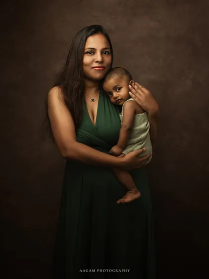 The same beautiful bond, now in rich, warm color. This version brings out the softness of their connection and the beautiful tones of her dress and their skin.
