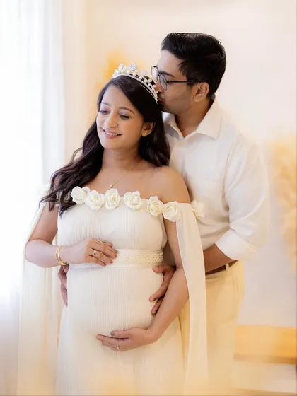 The 'you + me = three' excitement is so special. I focus on capturing these quiet, intimate moments between expecting parents, creating timeless couple portraits you will cherish forever.