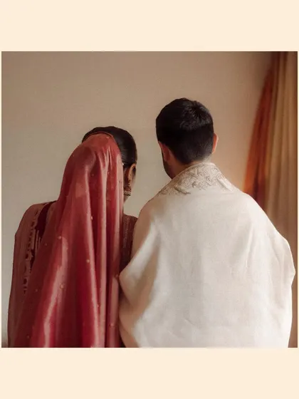 A simple, anonymous portrait from behind. This image focuses on their togetherness, a quiet statement of unity. Sometimes the most powerful portraits are the ones that leave something to the imagination.