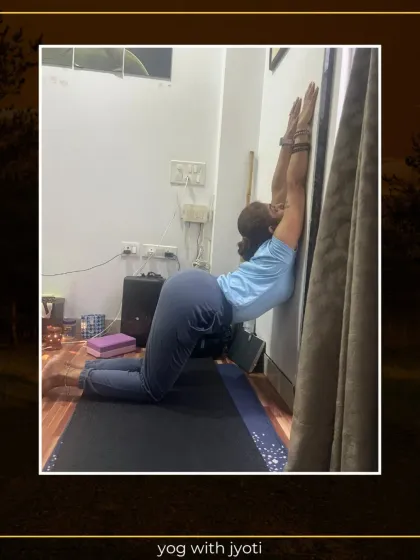 A personal practice moment, using the wall to deepen a heart-opening pose. Props are not just for students; they are essential tools for my own practice too.