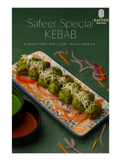 This is our Safeer Special Kebab. Marinated in a green herb and spice mixture and grilled, these tender kebabs are topped with cheese and served with our house chutneys.