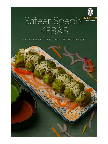 This is our Safeer Special Kebab. Marinated in a green herb and spice mixture and grilled, these tender kebabs are topped with cheese and served with our house chutneys.