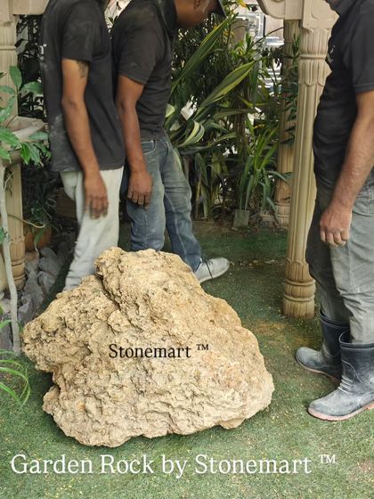 A closer look at a large garden rock before placement. Each monolith we offer is a unique piece from nature, with its own distinct shape and texture, ensuring no two landscapes are ever the same.