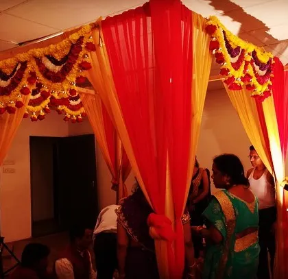 A view of the intimate mandapam setup during the ceremony. Even in a smaller space, I ensure the decor creates a sacred and beautiful setting for your vows.