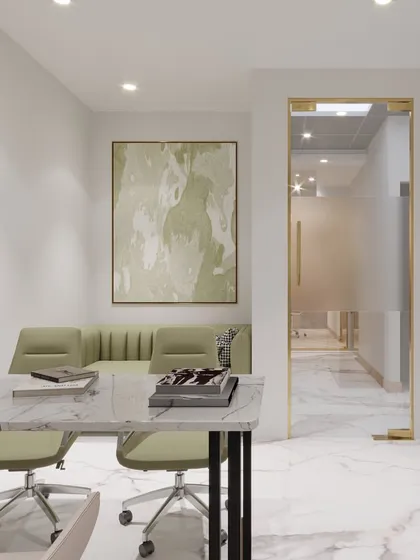 Here, we used a glass door with a sleek gold handle to connect the private cabin to the main office corridor. This maintains a visual link to the rest of the team while providing a quiet, focused area for individual work.
