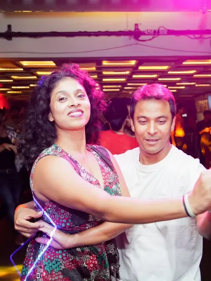 A throwback to a beautiful night at LA RUMBA. Here I am, leading a partner through a classic Salsa move, completely lost in the music.