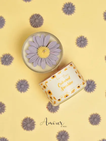 The calming purple sunflower candle, infused with lavender fragrance. It’s a unique twist on a classic flower.