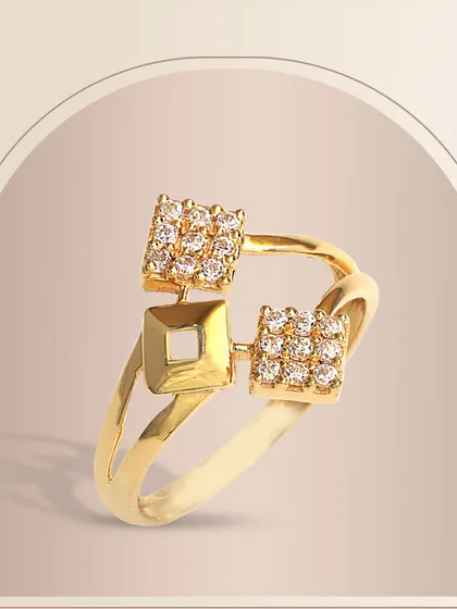 A contemporary gold ring featuring two square clusters of diamonds on an open, split-shank band. This geometric design is both modern and glamorous.